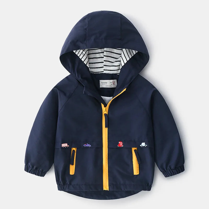 Front view of the blue Little Explorer Lightweight Jacket showing its hood, pockets and small decorative motifs.